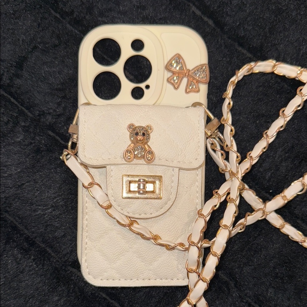 Cream Phone Case with Gold Chain and Bear Charm